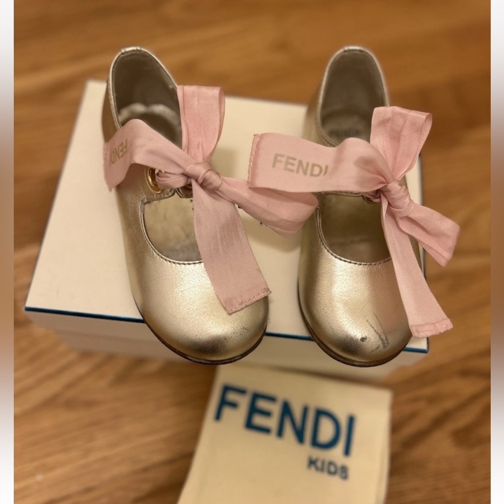 Fendi Kids Metallic Gold Shoes with Pink Bows. Pre-owned, good condition.